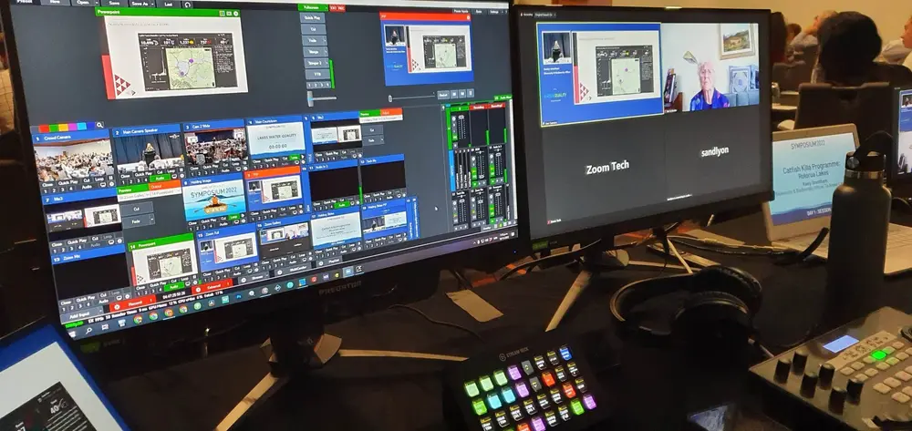 Live production software mixing room cameras, slides and a remote Zoom presenter for the Lakes Water Quality Symposium 2022