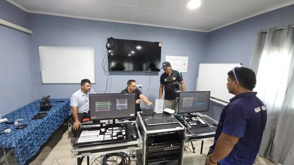 Manaia Go training Nauru TV staff on the restored OB system: TriCaster vision switcher, 3Play replay and NDI equipment in flight cases